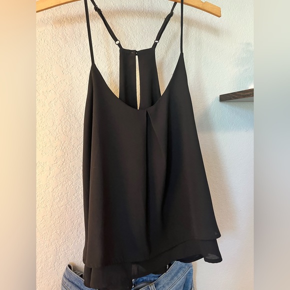 Black racerback top w/adjustable straps & button closure at the back of the neck - Picture 2 of 3